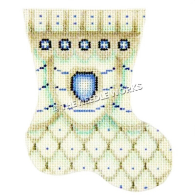 silver stocking with fish scale pattern and blue decorative dots and large blue oval on wave pattern