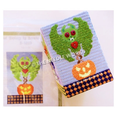 green bat flying above jackolantern with red eyes and heart button on neck with orange diamond pattern on blue bottom border