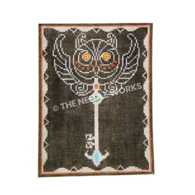 skeleton key on black background with white owl