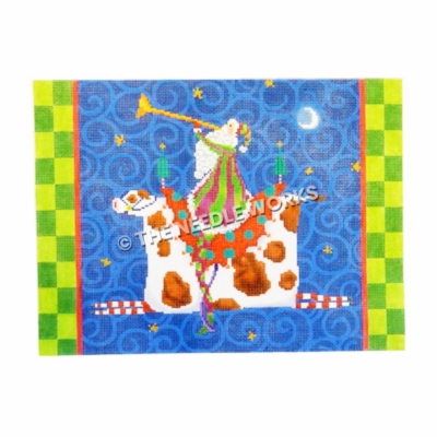 Santa blowing trumpet riding a white and brown spotted cow on blue swirled background and green checkered border