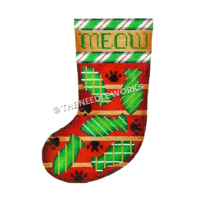 red and green stocking with green fish pattern and paw prints with Meow written on top