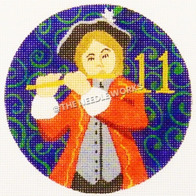blue ornament with piper in red suit and black and white hat with gold 11 and green swirl background