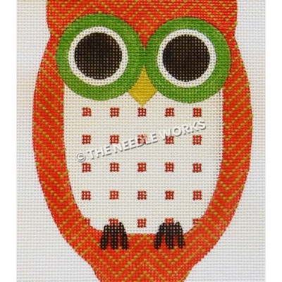 owl in red and green zigzag and white belly with red squares with green eyes