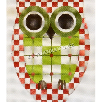 owl in red and white checkers and green and white plaid belly with green eyes