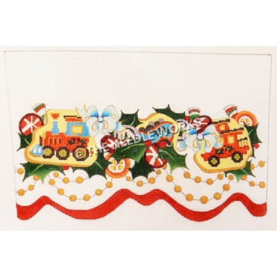 white stocking top with holly leaves, train cars, blue ribbon, red and orange candies with gold beaded trim and red ribbon at the bottom