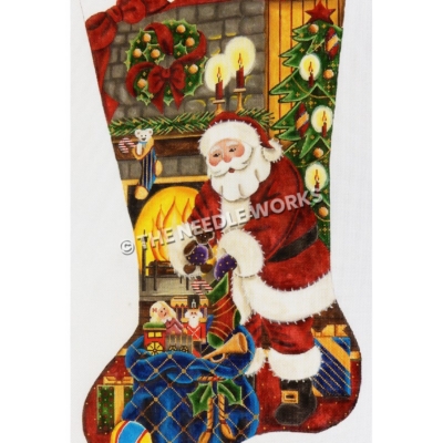 stocking with Santa pulling toys from blue bag in front of fireplace with stocking, wreath, candles, and Christmas tree