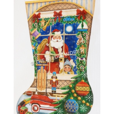 stocking with Santa looking through a window with garland decorated with toys and Christmas tree with train, fire truck, sled, nutcracker and football on floor