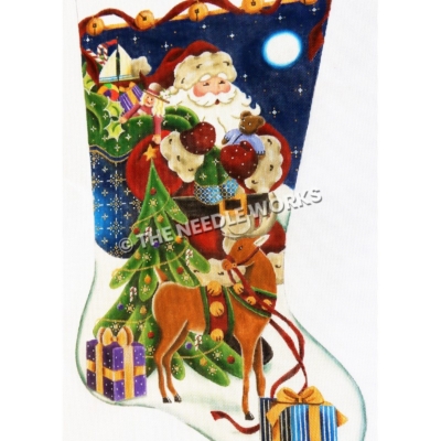 stocking with Santa in snow at night with blue and green bag of toys, Christmas tree, gifts and reindeer