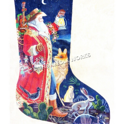 blue stocking with Santa wearing cowboy hat and carrying bag of toys, carrying lantern in desert landscape with coyote, roadrunner, jackrabbit, prairie dog and armadillo