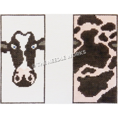 3D box with head of black and white cow on one side and body on other side