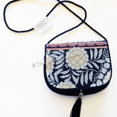 dark blue purse with snowflowers with pink patterned stripe