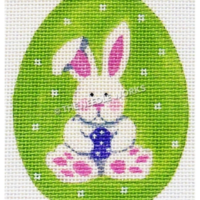 lime green Easter egg with white bunny holding purple egg