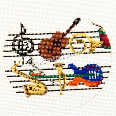 white round ornament with musical instruments on musical staff