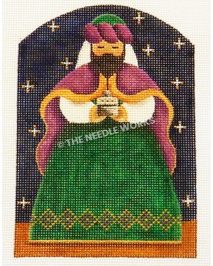 one of the three kings from nativity scene wearing green, white, and dark pink robe on dark blue starry sky