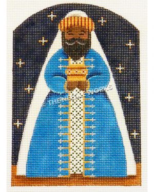 one of the three kings from nativity scene wearing blue and gold robe on dark blue starry sky