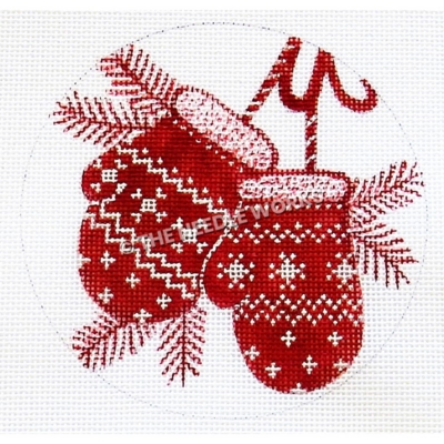 white ornament with red mittens and pine branches