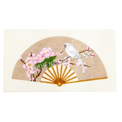 tan fan with white bird sitting on branch with pink flowers