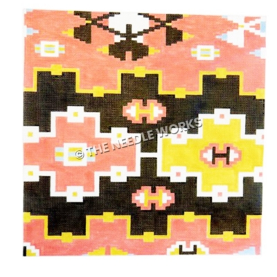 pink block with yellow, black, white and pink geometric kilim pattern