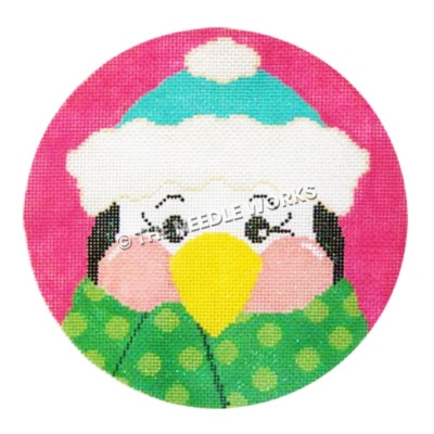 pink ornament with closeup of penguin in blue and white hat and green polka dot scarf