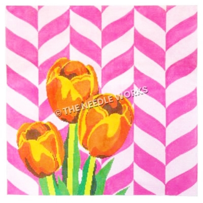 orange and yellow tulips with pink and white chevron background