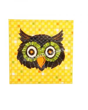 black owl head with green eyes and star pupils on yellow checkered background with orange, green, and white square accents