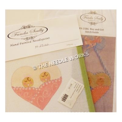 heart shaped ornament with two babies in pink blanket