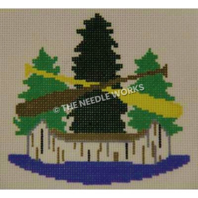 canoe with yellow and brown oars and three evergreen trees