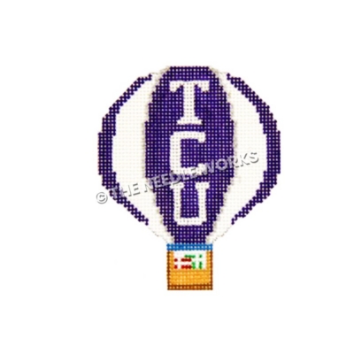 purple and white hot air balloon with TCU written in white and gifts in basket