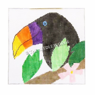 toucan head in profile with green leaves on branch and pink flower below