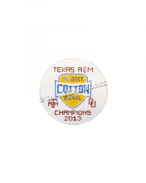 white round ornament with AT&T Cotton Bowl logo and Texas A&M and OU Champions 2013 written in maroon