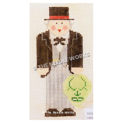 gray-haired wizard from Wizard of Oz wearing gray striped suit with black jacket and top hat holding the green mask of the Wizard