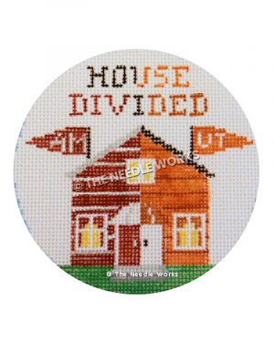 round white ornament with maroon and burnt orange house and House Divided written and AM and UT pennants flying from house