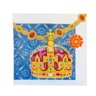 elaborate crown with jewels with cross on top and jeweled necklace with blue and white decorative background and orange flower