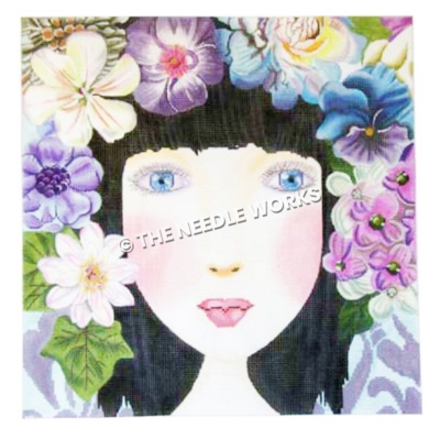 dark-haired woman with blue eyes surrounded by purple, blue, and white flowers