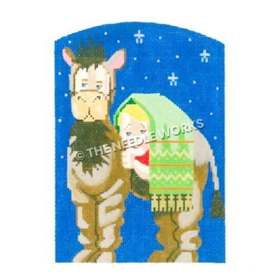 nativity camel with child hiding in green blanket on back with starry background