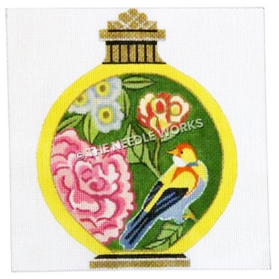 yellow jar with bird and flowers decorations