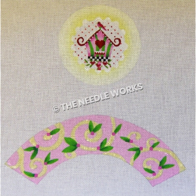 pink and green birdhouse with pink bird on top, pink and green decorative border