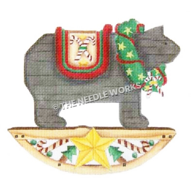rocking bear on with wreath and candy cane decorations