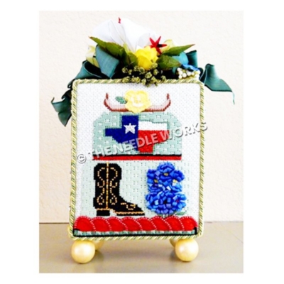 3D box with Texas themed cake decoration and yellow rose with green ribbons on top