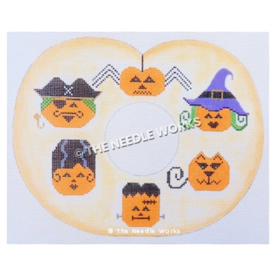 Halloween wreath with jack-o-lanterns in costumes