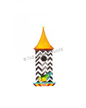 black and white zigzag birdhouse with green, yellow and blue bird