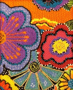 vivid purple, red, blue, orange and green beaded flowers