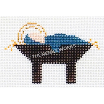baby Jesus in blue blanket and black manger