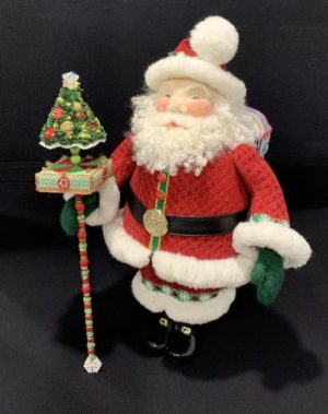 3D Santa with cane topped by rectangular box and Christmas tree