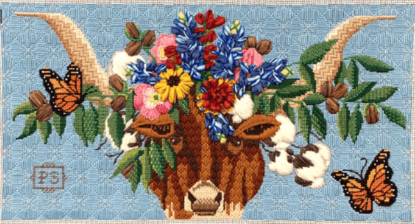 longhorn head with cotton and pecan branches and pink, yellow, red and blue flowers piled on head and yellow monarch butterflies flying around