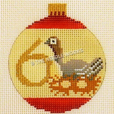 yellow and red ornament with goose and eggs and number 6 in gold