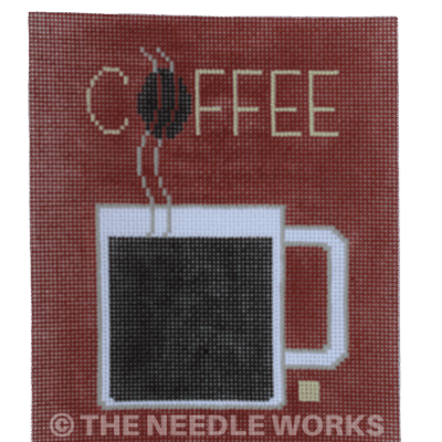 coffee in white mug with Coffee in yellow letters on dark brown background