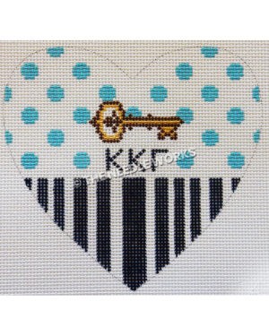 white heart with blue dots at top and black stripes on bottom half and gold key with kappa kappa gamma Greek letters