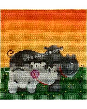 mother and baby rhinos on green grass with yellow flowers with orange sky background