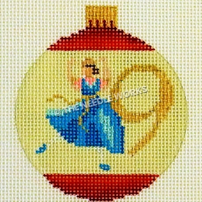 yellow and red ornament with lady dancing and number 9 in gold
